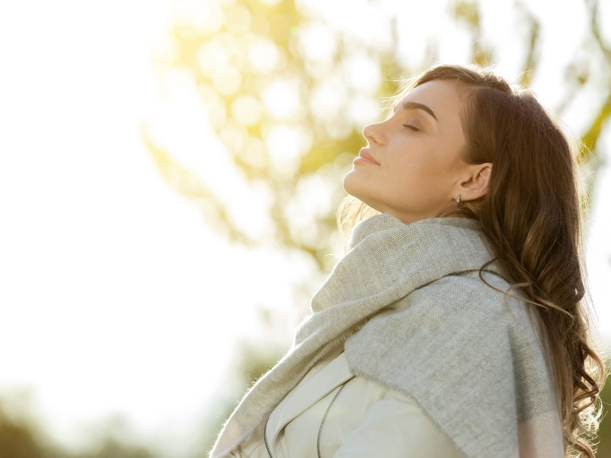 A women feeling refreshed after Frequency Specific Microcurrent and Acupuncture treatment.