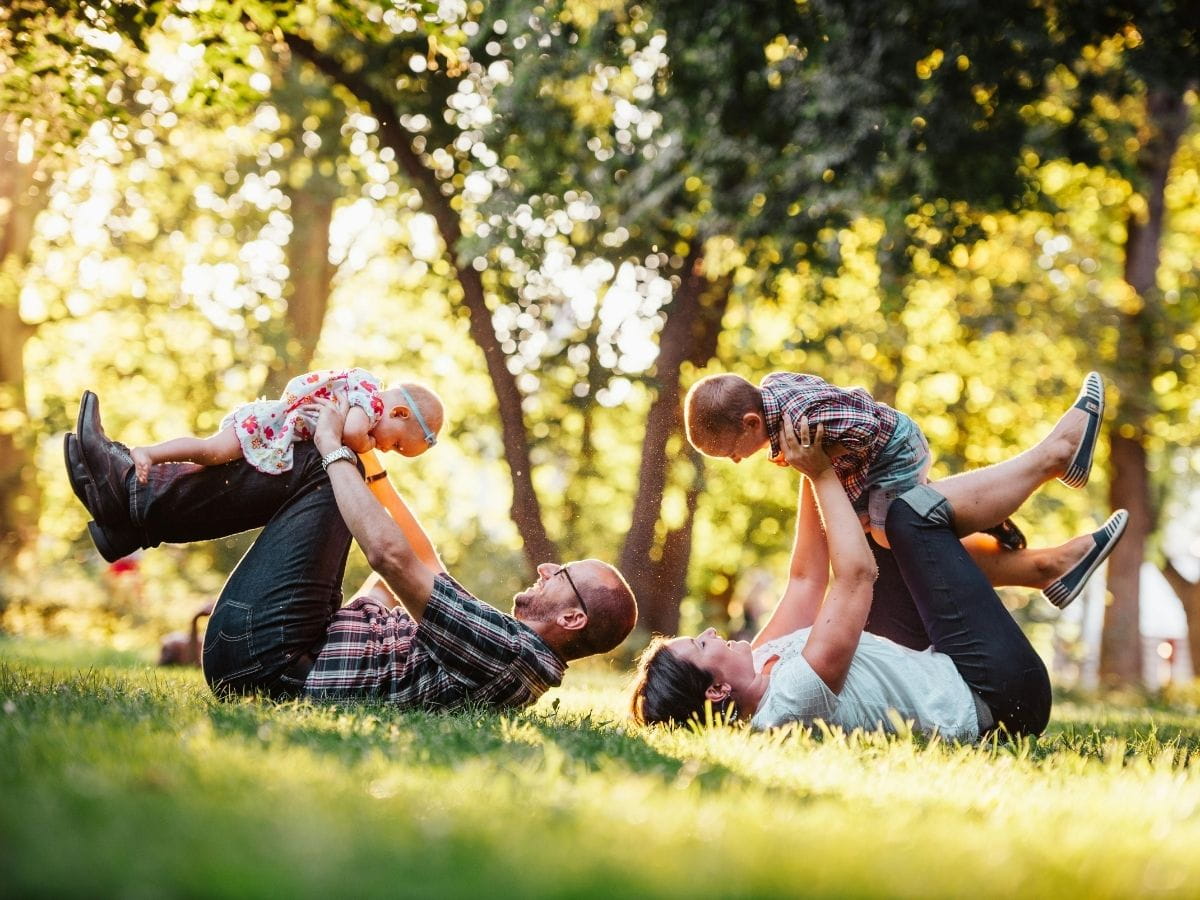 A family enjoying time outdoors while living well with autoimmune disease after an appointment at Lim Acupuncture Clinic.