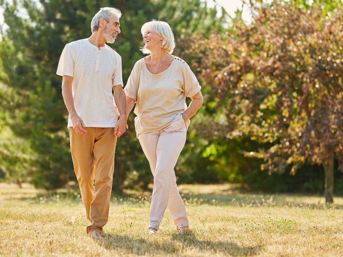 Couple enjoying improved mobility and quality of life after peripheral neuropathy treatment.